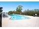 Community pool with plenty of lounge chairs at 6550 Evergreen Park Dr, Lakeland, FL 33813