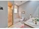 Bathroom with double vanity, shower, and bathtub at 7068 Island Lake Ln, Lakeland, FL 33813