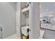 Laundry room with built-in shelving and a sink at 7068 Island Lake Ln, Lakeland, FL 33813