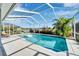 Enclosed pool area with a lake view at 7068 Island Lake Ln, Lakeland, FL 33813