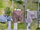 Aerial view showing a house's location and surrounding properties at 8 Sawfish Ln, Kissimmee, FL 34759