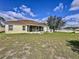 Large backyard with spacious lawn at 8 Sawfish Ln, Kissimmee, FL 34759