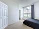 Bedroom with large window and closet at 8 Sawfish Ln, Kissimmee, FL 34759