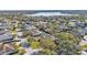 Aerial view of the neighborhood and lake at 875 Hanover Way, Lakeland, FL 33813