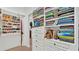 Well-organized closet with shelving, drawers, and hanging space for clothes and accessories at 875 Hanover Way, Lakeland, FL 33813