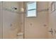 Clean shower with tiled walls and glass enclosure at 875 Hanover Way, Lakeland, FL 33813