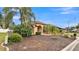 Single-story house with a lush, well-manicured lawn at 6714 Highlands Creek Loop, Lakeland, FL 33813