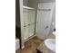 Bathroom with walk-in shower and tile floor at 1038 Suffragette Cir, Haines City, FL 33844