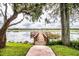 Picturesque wooden dock extending over a calm lake, perfect for relaxation at 1130 N Lake Parker Ave # A202, Lakeland, FL 33805