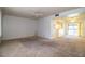 Open living room and kitchen area with ample space at 1130 N Lake Parker Ave # A202, Lakeland, FL 33805