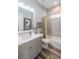 Well-lit bathroom featuring a vanity with drawers, bathtub, and stylish tile at 127 W Belmar St, Lakeland, FL 33803