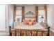 Comfortable bedroom featuring a decorative headboard and side tables with lamps at 127 W Belmar St, Lakeland, FL 33803