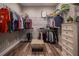 Organized walk-in closet with shelves and hanging space for clothing and accessories at 127 W Belmar St, Lakeland, FL 33803