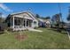 Attractive homes on a street featuring a manicured lawns and inviting front porches at 127 W Belmar St, Lakeland, FL 33803