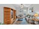 Cozy living room with decorative bookshelves and neutral color palette at 1336 Melrose St, Lake Alfred, FL 33850