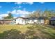 Back of house with large backyard at 1418 Grace N St, Lakeland, FL 33810