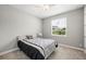 Cozy bedroom with hardwood floors and window with natural light at 1427 Magnolia Ln, Auburndale, FL 33823