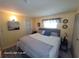 Bright bedroom with king-size bed and en-suite bathroom at 1540 Skyview Ct, Lakeland, FL 33801