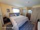 Spacious main bedroom with king-size bed and ample closet space at 1540 Skyview Ct, Lakeland, FL 33801