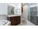 Bathroom with double vanity, shower, and soaking tub at 155 Kissengen Park Blvd, Bartow, FL 33830