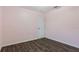 Simple bedroom with wood-look floors and light pink walls at 155 Kissengen Park Blvd, Bartow, FL 33830