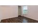 Small bedroom with light pink walls and wood-look floors at 155 Kissengen Park Blvd, Bartow, FL 33830