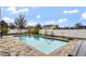 Inviting rectangular pool with a large patio area at 155 Kissengen Park Blvd, Bartow, FL 33830