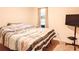 Spacious bedroom with a TV and large bed at 1726 Eagle Hammock Blvd, Eagle Lake, FL 33839