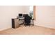 Home office with desk, chair, and mini-fridge at 1726 Eagle Hammock Blvd, Eagle Lake, FL 33839