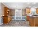 Bright dining area with wood cabinets and built-in hutch at 1801 Quail Hill Dr, Lakeland, FL 33810