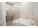 Bathroom with shower and soaking tub at 1836 James Towne Ln, Bartow, FL 33830