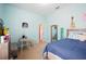 Bright bedroom with twin bed and desk at 1836 James Towne Ln, Bartow, FL 33830