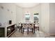 Bright dining room featuring a table with six chairs at 1836 James Towne Ln, Bartow, FL 33830