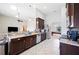 Modern kitchen featuring stainless steel appliances, granite countertops, and an open layout at 1836 James Towne Ln, Bartow, FL 33830