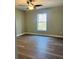 Spacious bedroom with ceiling fan and vinyl flooring at 2006 Kendrick Ln, Lakeland, FL 33805