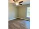 Bright bedroom with ceiling fan and vinyl flooring at 2006 Kendrick Ln, Lakeland, FL 33805