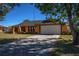 Front yard view of single Gathering home at 2070 Katie Ct, Winter Haven, FL 33884