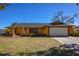 House exterior with a two-car garage at 2070 Katie Ct, Winter Haven, FL 33884