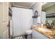 Bathroom with granite countertop and a white vanity at 2227 Howard West Ave, Winter Haven, FL 33880