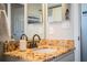 Bathroom vanity with granite countertop and oil rubbed bronze fixtures at 2227 Howard West Ave, Winter Haven, FL 33880