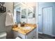 Bathroom vanity with granite countertop and oil rubbed bronze fixtures at 2227 Howard West Ave, Winter Haven, FL 33880