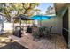 Outdoor kitchen with grill and bar-height seating at 2227 Howard West Ave, Winter Haven, FL 33880