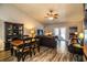 Open concept living room and dining area with wood floors at 2227 Howard West Ave, Winter Haven, FL 33880