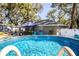 Above ground pool in sunny backyard setting at 2227 Howard West Ave, Winter Haven, FL 33880