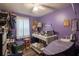 Bright bedroom with sewing station and ample natural light at 2304 Honey Dr, Lakeland, FL 33801