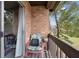 Private balcony with brick wall and seating at 2369 Tom Jones St # 8, Orlando, FL 32839