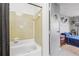 Simple bathroom with shower/tub and tiled walls at 2369 Tom Jones St # 8, Orlando, FL 32839