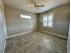 Spacious bedroom with tile flooring and window at 265 Laynewade Rd, Polk City, FL 33868