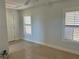 Bright bedroom with white shutters and ceiling fan at 265 Laynewade Rd, Polk City, FL 33868