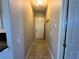 Interior hallway with tiled floors and access to other rooms at 265 Laynewade Rd, Polk City, FL 33868